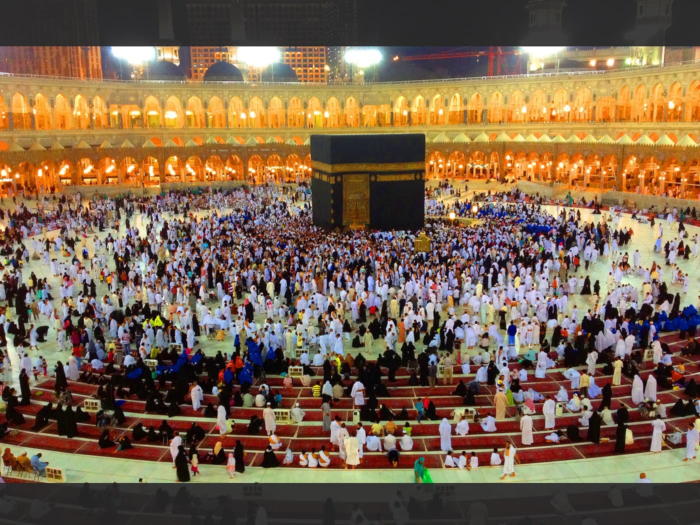 Pilgrims circling the Kaaba at night in Masjid al-Haram, Makkah